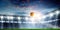 Football stadium background with flying ball