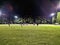 Football Training at Night on Floodlit Sports Ground