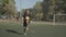 Footballer juggling and controlling soccer ball