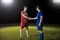 Footballer shaking hands after the game