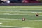 Footballs on a field