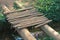 FOOTBRIDGE CROSSING OVER STREAM OF WATER