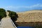 Footbridge leading to beach sand dunes