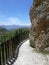 Footbridge on mountain sidewalk