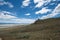 Foothills in Antelope Island State Park in Utah. Extra sky in the photo. Birds flying