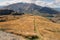 Footpath across grassy hills in Southern Alps