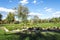 A footpath along landscaped garden area in Bundek city park, Zagreb, Croatia