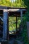 Footpath going through a demolished wooden shed