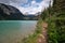 Footpath beside green waters of Sherbrooke Lake, Yoho National Park