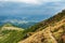 Footpath high in the mountains. Hiking path in the highlands