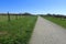 Footpath leading through the North Kent countryside to the Jeskyns statues