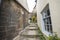 Footpath between old english country cottages in village