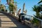 Footpath with people from Torviscas Playa beach in Costa Adeje, Tenerife, Spain