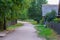 Footpath running along the rural of wooden houses