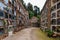 Footpath between walls with graves, on Montjuic Cemetery, Barcelona, Spain