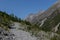 Footpath in Welschtobel valley near Arosa, sunlight, forest, deb