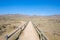 Footpath between wooden banisters to protect nature of Cabo de Gata Natural Park in Almeria