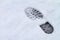 Footprint over snow