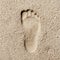 Footprint in sand, hi contrast style, stoneage