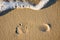 Footprint on a sandy beach