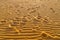 Footprints Desert sand. Dunes Landscape at Sunrise