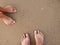Footprints of a loving couple in the sand on the seashore