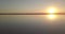 Footprints on a Salt Lake at Sunset