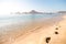 Footprints in the sand on the beach in Cabo San Lucas.