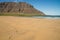 Footprints on sandy beach in Iceland