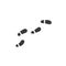Footprints from shoes. Logo or icon. Simple, concise sign.