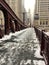Footprints on snow covered bridge across the Lasalle Street bridge in Chicago Loop