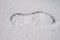 Footprints on the snow. Imprint of an adult man& x27;s footwear on a