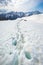 Footprints in snow near Muhu Pass, Karachay-Cherkessia. Caucasus Mountains