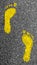 Footprints yellow feet