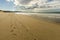 Footsteps on the beach perspective