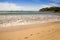 Footsteps in the sand on a beach