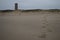 Footsteps in the Sand and Water Tower on a Beach in Domburg, Zeeland, Netherlands