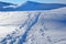 Footsteps on the snow in the Alps