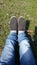 Footwear black shoes in garden sunlight