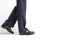 Footwear Concept: Closeup of Stylish Black Shiny Male Semi-Brogue Against White