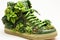 Footwear that takes into consideration its carbon emissions, incorporating greenery and advocating for an improved environmental