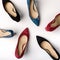 Footwear for women. High heels. Top view different colors of high heels. Fashion and beauty concept.