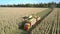 Forage harvester mows corn and uploads into vehicle