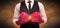 Forceful businessman boxing