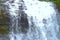 Forceful Flow of Water with Sprinkling of White Drops - Waterfall Illustration