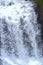 Forceful Flow of Water with Sprinkling of White Drops - Waterfall Illustration