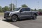 Ford F-150 Lightning display. Ford offers the F150 Lightning all-electric truck in Pro, XLT, Lariat, and Platinum models