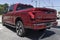 Ford F-150 Lightning display. Ford offers the F150 Lightning all-electric truck in Pro, XLT, Lariat, and Platinum models