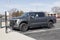 Ford F-150 Lightning display. Ford offers the F150 Lightning all-electric truck in Pro, XLT, Lariat, and Platinum models