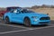 Ford Mustang display at a dealership. Ford offers the Mustang in a base model, GT, Mach 1 or Shelby GT500